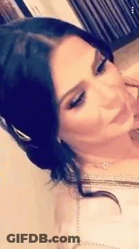 Woman With Dark Hair Close Up GIF
