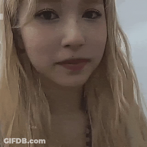 Woman With Dots On Eyelashes GIF