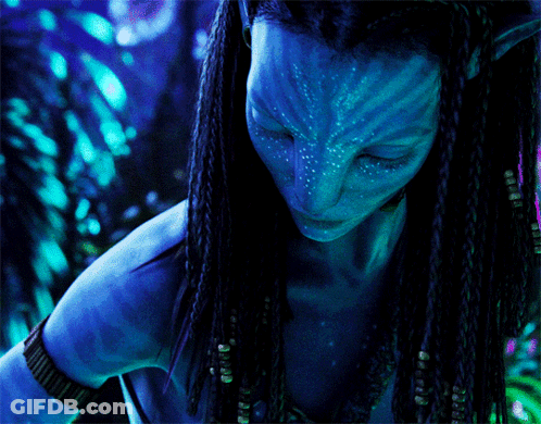 Woman With Dreadlocks And Blue Face Paint GIF