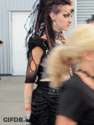 Woman With Dreadlocks And Choker GIF