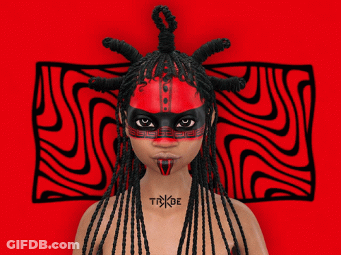 Woman With Dreadlocks And Trxbe Tattoo GIF
