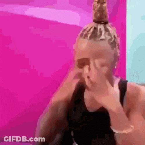 Woman With Dreadlocks Covering Face GIF