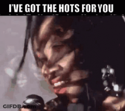 Woman With Dreadlocks Holding Gun Says I've Got The Hots For You GIF