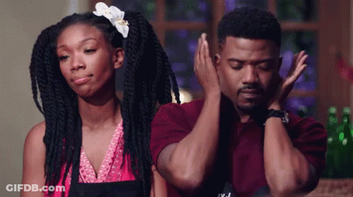 Woman With Dreadlocks Next To Man GIF