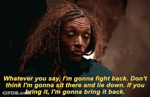 Woman With Dreadlocks Talking About Fighting Back GIF