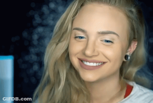 Woman With Ear Piercing Smiling GIF