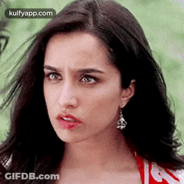 Woman With Earrings And Red Shirt GIF