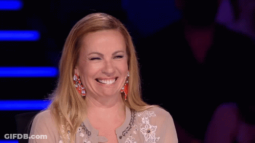 Woman With Earrings Smiling GIF