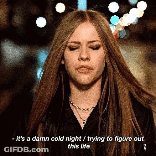Woman With Eyes Closed And Cold Night Words GIF