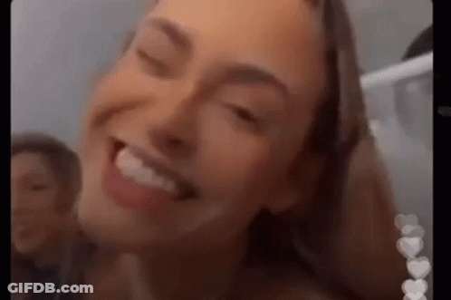 Woman With Eyes Closed And Mouth Open GIF