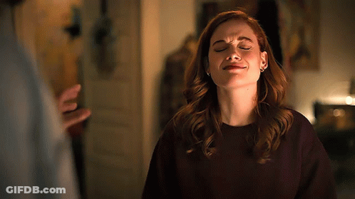 Woman With Eyes Closed And Mouth Open GIF
