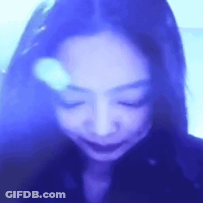 Woman With Eyes Closed Blue Background GIF