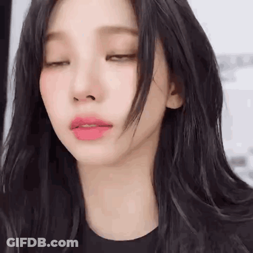 Woman With Eyes Closed GIF