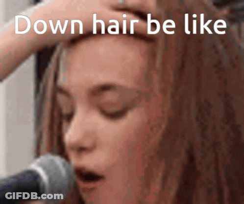 Woman With Eyes Closed Hand To Forehead In Front Of Microphone Saying Down Hair Be Like GIF