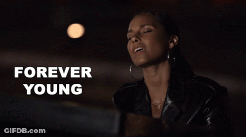 Woman With Eyes Closed Saying Forever Young GIF
