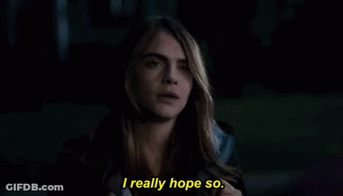 Woman With Eyes Closed Saying I Really Hope So GIF