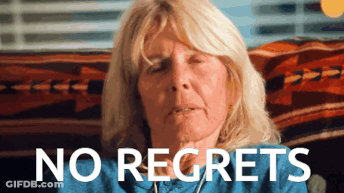 Woman With Eyes Closed Saying No Regrets GIF
