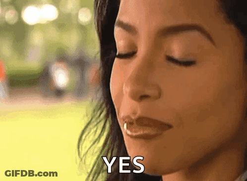 Woman With Eyes Closed Saying Yes GIF