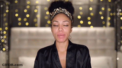 Woman With Eyes Closed Wearing Headband GIF
