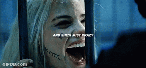 Woman With Face Tattoo Behind Bars GIF