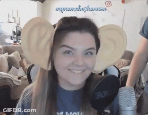 Woman With Fake Ears Smiling At Microphone GIF