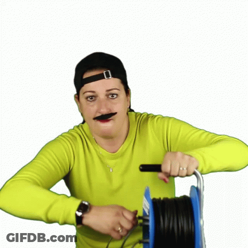 Woman With Fake Mustache Holding Wires GIF