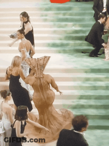 Woman With Fan Surrounded By People GIF