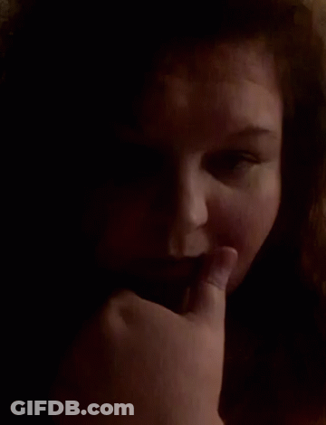 Woman With Finger On Mouth GIF