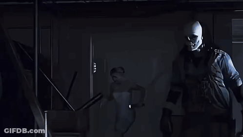 Woman With Flashlight On Head Looking Down GIF