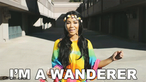Woman With Flower Crown Saying I'm A Wanderer GIF