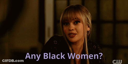 Woman With Flower In Hair Asking About Black Women GIF