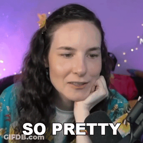 Woman With Flower In Hair At Microphone Saying So Pretty GIF
