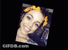 Woman With Flower In Hair Upside Down GIF