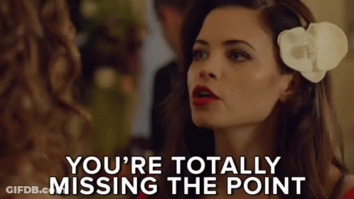 Woman With Flower Saying You're Totally Missing The Point GIF
