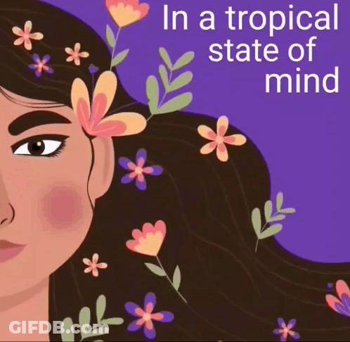 Woman With Flowers In Hair In A Tropical State Of Mind GIF