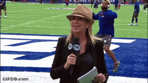 Woman With Fox Logo On Hat GIF