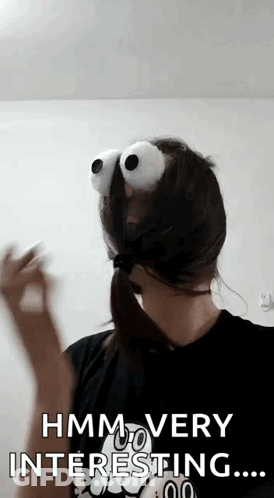 Woman With Giant Googly Eyes Says Hmm Interesting GIF
