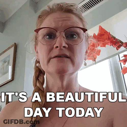 Woman With Glasses And Braids Says It's A Beautiful Day GIF