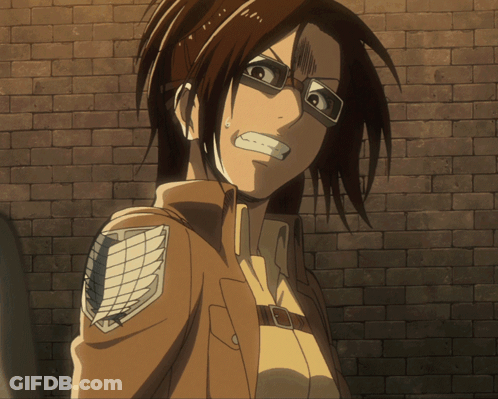 Woman With Glasses And Brick Wall GIF