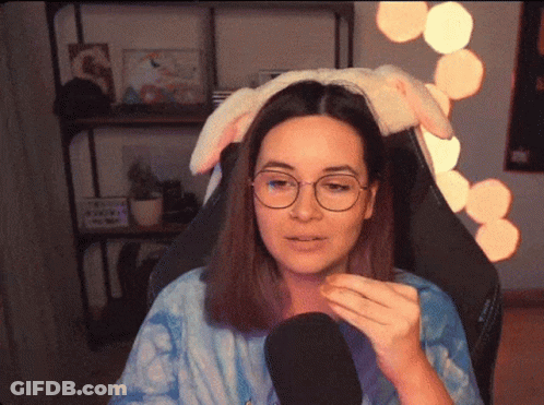 Woman With Glasses And Bunny Ear Headband GIF