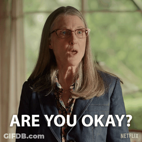 Woman With Glasses And Denim Jacket Saying Are You Okay GIF