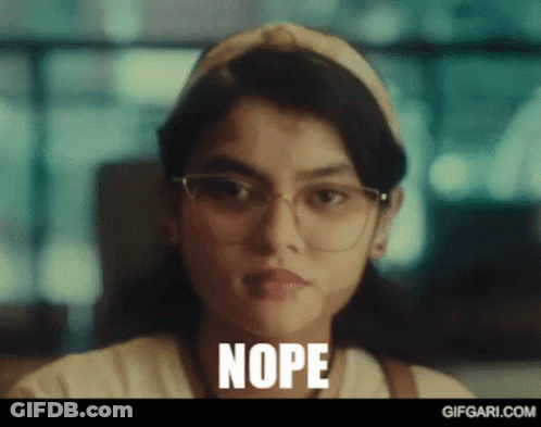Woman With Glasses And Headband Making Funny Face Nope GIF