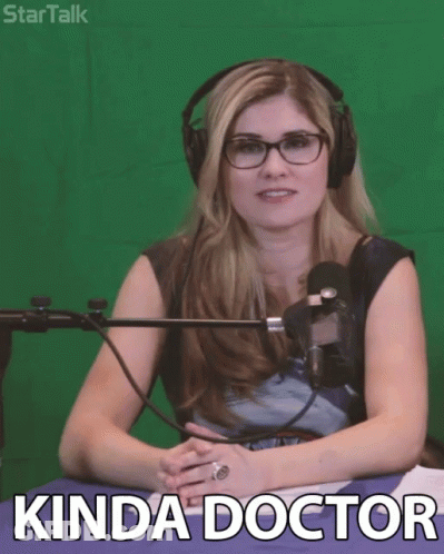 Woman With Glasses And Headphones In Front Of Green Screen Saying Kinda Doctor GIF