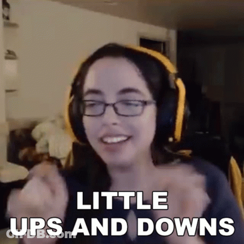 Woman With Glasses And Headphones Making Funny Face Saying Little Ups And Downs GIF