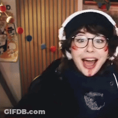 Woman With Glasses And Headphones Smiling Blood On Face GIF
