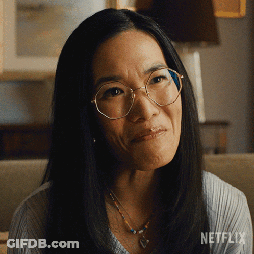 Woman With Glasses And Necklace Netflix Logo GIF