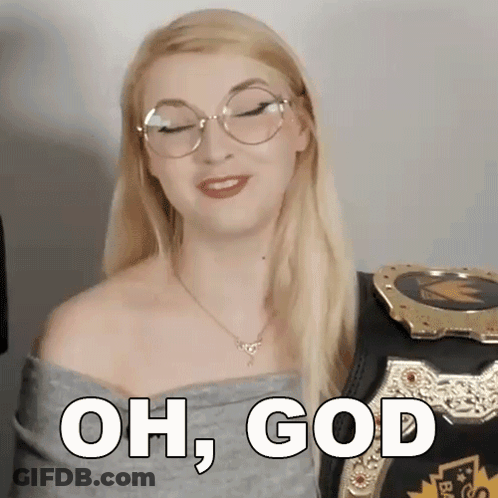 Woman With Glasses And Necklace Next To Wrestling Belt Saying Oh God GIF