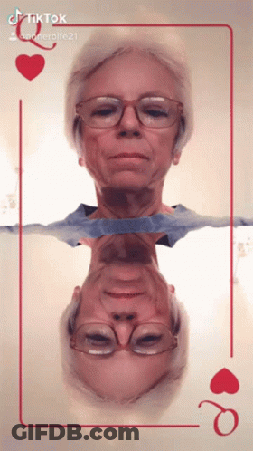 Woman With Glasses And Queen Of Hearts Card GIF
