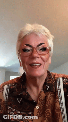 Woman With Glasses And R On Collar GIF