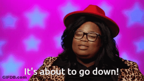 Woman With Glasses And Red Hat Says It's About To Go Down GIF